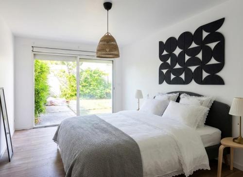 2 maisons réunies de plain-pied 6 chambres hypercentre et à 300 m de la plage Accueil humain