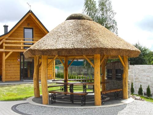 Iekārtas, Holiday homes with fireplaces, playground in Mocki