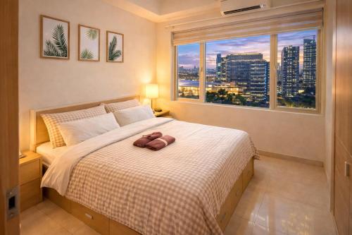 907 Air Condo 1BR Shell Residences 2 Min to MOA - Manila