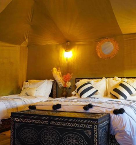 Bed, Sahara Ember luxury Camp in Merzouga