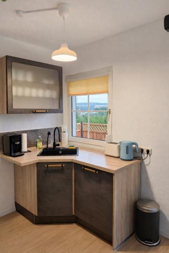 Chalet mit Sauna, Kamin & Fernblick im Steigerwald in 施呂瑟爾費爾德