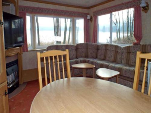 Iekārtas, Mobile Home im Ferienpark mit Seezugang in Dabel