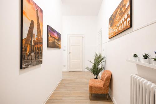Shared lounge/TV area, Tiro Suites in the center of Bologna in Santo Stefano