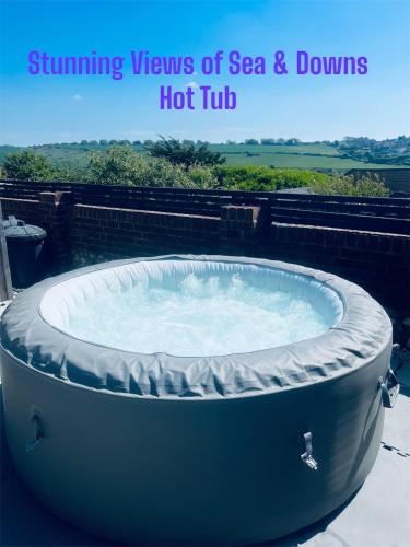 Studio Cabin Retreat with Hot Tub Sea and Downs views in Seaford with own garden in Seaforde