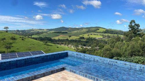Peldbaseins, Carmelo Morada do Sol in Siqueira Campos