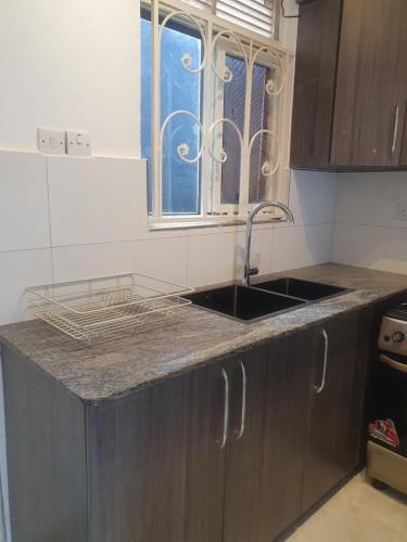 Two Bedrooms Apartment, located between kajjansi and kitende, with one bathroom, a living room, full in Kajjansi