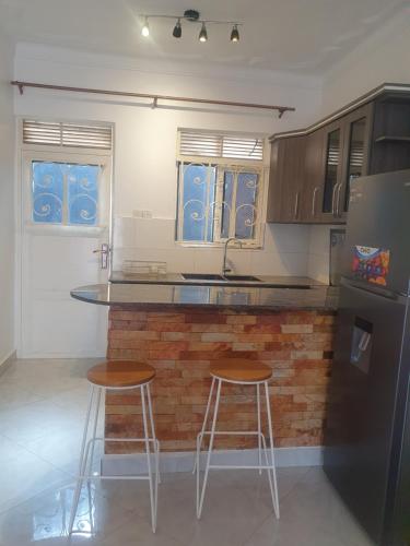 Two Bedrooms Apartment, located between kajjansi and kitende, with one bathroom, a living room, full in Kajjansi