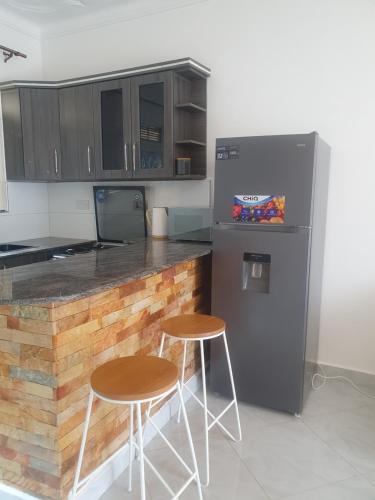 Two Bedrooms Apartment, located between kajjansi and kitende, with one bathroom, a living room, full in Kajjansi