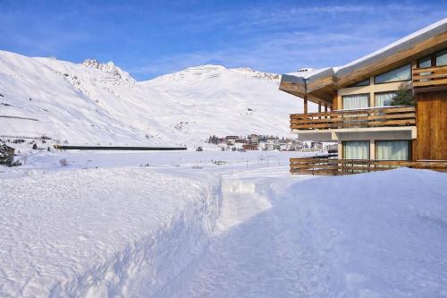外観, Appartement 4 etoiles Tignes vue lac et montagne, 8 pers Chalet Gypaetus in ティニュ