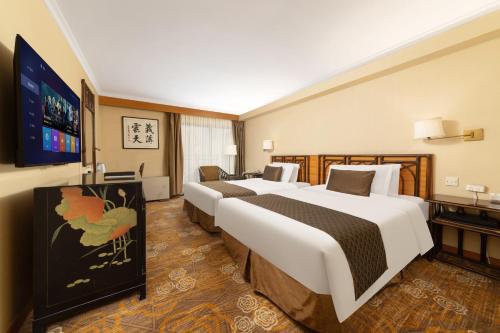 Chambre avec 2 lits, vue sur le lac