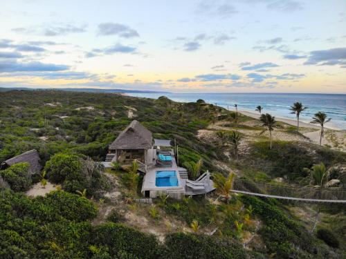 酒店外观, 特拉维斯亚海滩山林小屋 (Travessia Beach Lodge) in 白坯