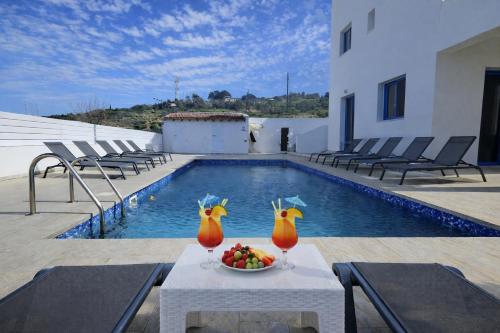 Yüzme havuzu, Livia - Vikles Villas in Pomos