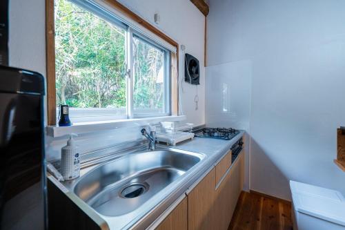 simAsim Cottage Kouri in Nakijin