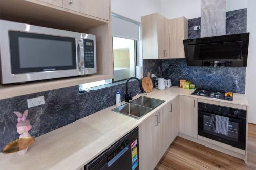 Kitchen, Renovated House in Concord Near Train & Parking in Drummoyne