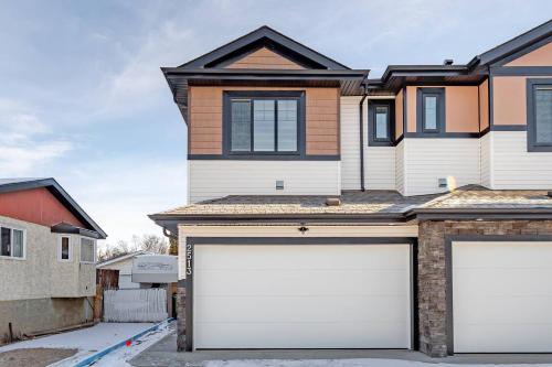 Modern Duplex with AC Nearby Grey Nuns & Sleeps 8 – khách sạn tại Southeast Edmonton