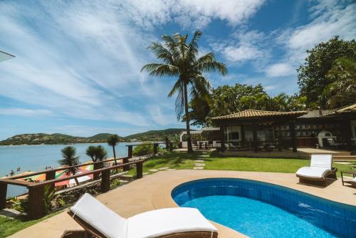 House with 5 suites on the sand of Ferradura Beach – khách sạn tại Bãi Biển Ferradura
