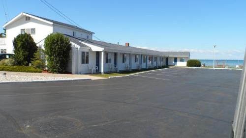 Sunrise Beach Motel Sunrise Beach Motel is conveniently located in the popular Mackinaw City area. The property features a wide range of facilities to make your stay a pleasant experience. All the necessary facilities, i