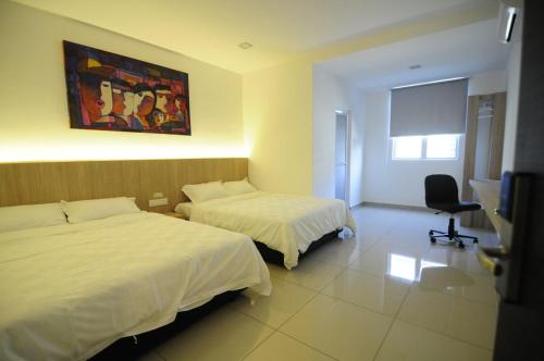 Deluxe Quadruple Room room in i-homey guesthouse