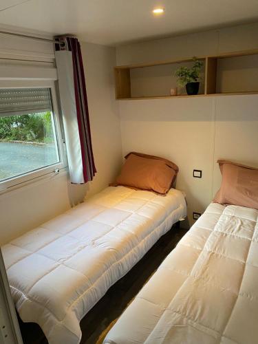 Mobilhome proche océan, piscine chauffée (Mobilhome proche ocean, piscine chauffee) in كابريتون