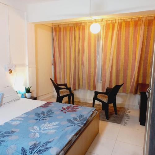 cozy room in koregaon park photo 5