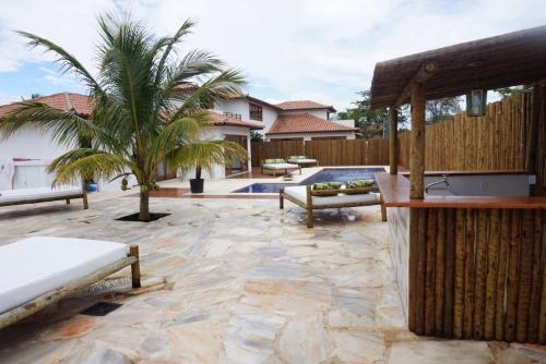 정원, Villa Ferradura Mar in 페라두라 비치