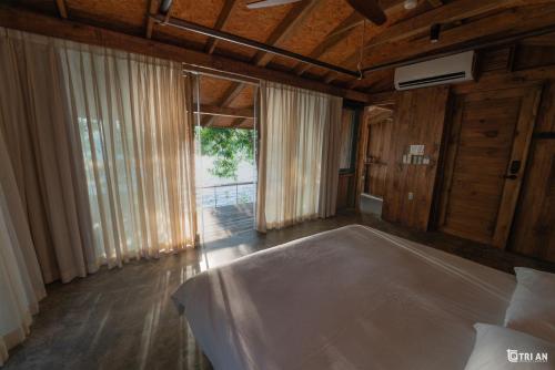 Guestroom, Tri An Retreat- TRI AN RETREAT in Xa Gia Tan