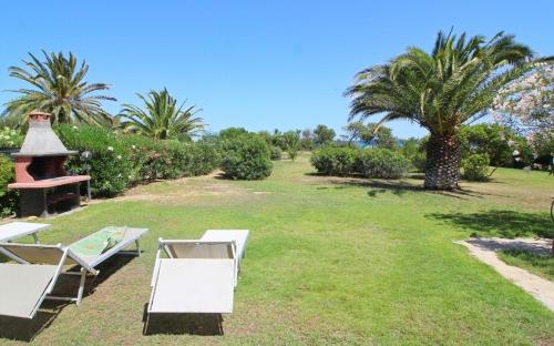 Costa Rei Villa in Prima Fila Mare con Ampio Giardino