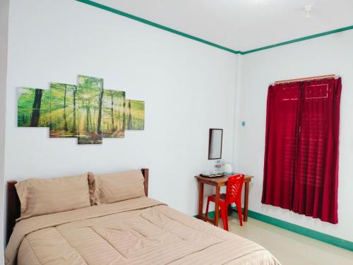 Tanah merah guest house in Singkawang