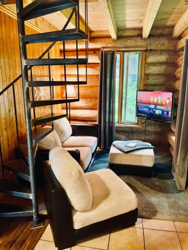 Le Rondin, Chalet en bois rond avec spa in Saint-Gabriel-de-Valcartier (QC)
