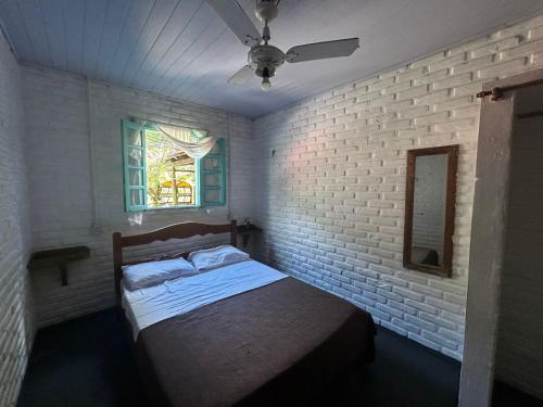 Mais Um Dia Hostel in Armacao