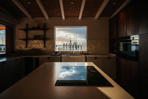 Palvelut, La maison dans la mer in Saint-Pierre