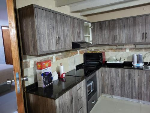 cuisine, Complejo Residencial Las Lomitas in Villa Elisa