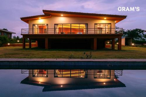 Exterior view, Gram's at Shivom, Pawna Lake by StayVista  in Lonavala