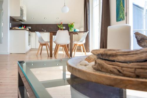 Ostseegarten Langholz - Ferienwohnung Waterblick bis 4 Pers in Waabs