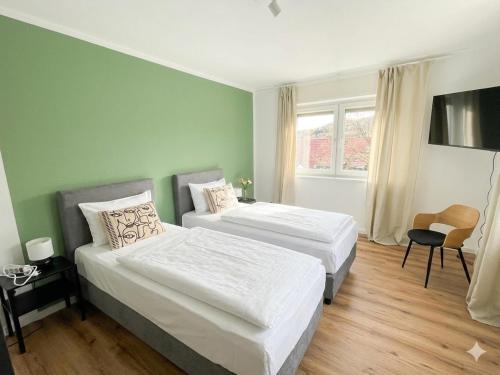 Familien, Firmen und Gruppen willkommen - 3 Schlafzimmer, luxuriöse Einzelbetten, Nahe Ulm (Apartmenthaus, Ferienwohnung Gluck fur Familien,Firmen,Gruppen,Monteure,3 Schlafzimmer bis 6 Persone) in Eselsberg