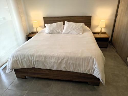 Bello Apartasuite con Piscinas y Vista al Mar