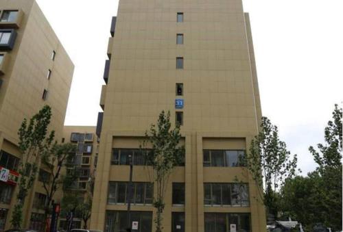 Вход, Qingdao Mi Apartment in Кингдао