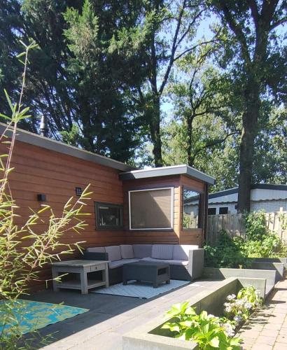 Modern Veluwe Wooden Chalet with Private Garden - Forest and Sauna Nearby