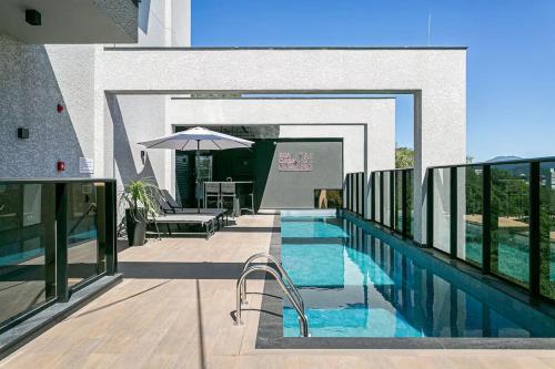 Úszómedence, Loft aconchegante com piscina próximo à Vila Germânica (Loft aconchegante com piscina proximo a Vila Germanica) in Blumenau