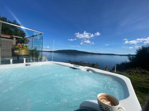 Stunning oceanfront home 4br3b sunrise beachcombing near Bamberton Park in Brentwood Bay