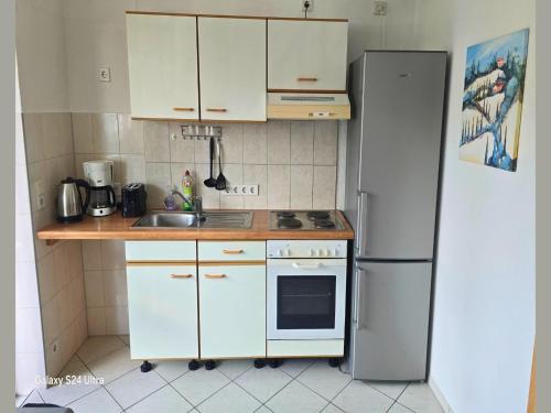 virtuve, Mobile Home im Ferienpark mit Seezugang in Dabel