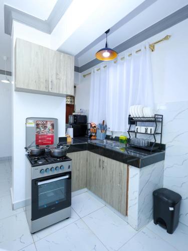 Kitchen, Cosy City view Studio near Mombasa Airport and SGR in Mombasa