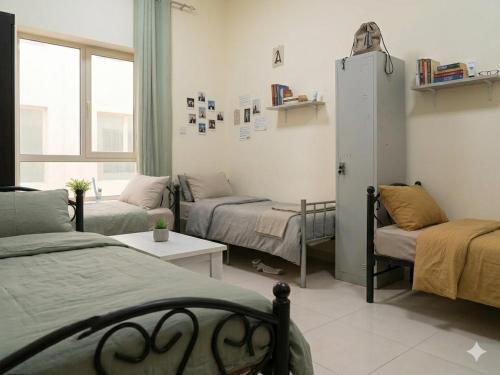 ALEX Hostel - Bed in a shared room - H101, Charjah