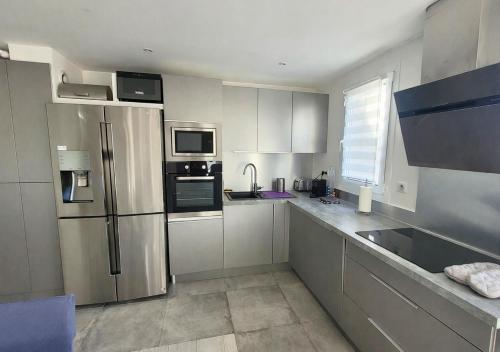 Duplex 105m2 Terrasse et Balnéo - Parking Privé - Proche Paris (Duplex 105m2 Terrasse et Balneo - Parking Prive - Proche Paris) in Сан-Бріс-су-Форе