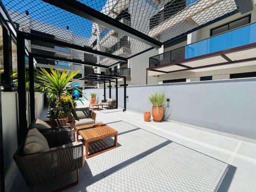 Oásis do Atlântico 402 A – Apartamento amplo em condomínio completo a apenas 5 minutos da Praia de Palmas - image 4