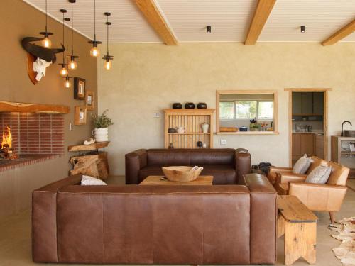 Koplietošanas atpūtas telpa ar TV, Stroomrivier Lodge in Koster