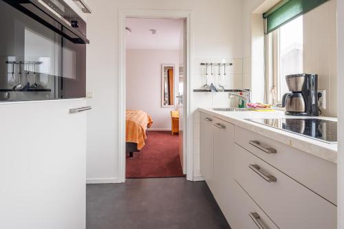 kuhinja, Appartementen de Strandloper in Bergen