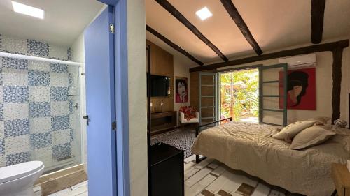 Suite com jardim privativo - Casa das Bromélias - 02 (Suite com jardim privativo - Casa das Bromelias - 02) in Moura Brazil