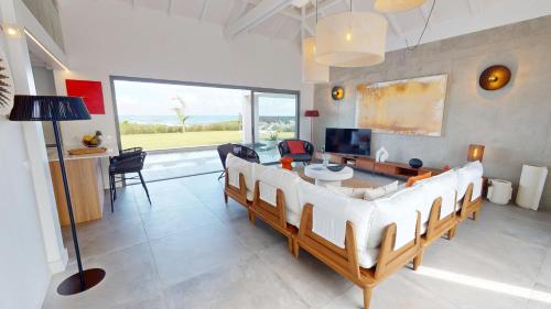 Palvelut, AQUAWAVES - Villa VAGUELIS 6 à 8 personnes - Front de Mer au Moule - vue Désirade & Surf (AQUAWAVES - Villa VAGUELIS 6 a 8 personnes - Front de Mer au Moule - vue Desirade & Surf) in Le Moule