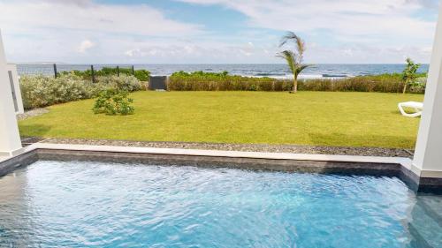 Palvelut, AQUAWAVES - Villa VAGUELIS 6 à 8 personnes - Front de Mer au Moule - vue Désirade & Surf (AQUAWAVES - Villa VAGUELIS 6 a 8 personnes - Front de Mer au Moule - vue Desirade & Surf) in Le Moule